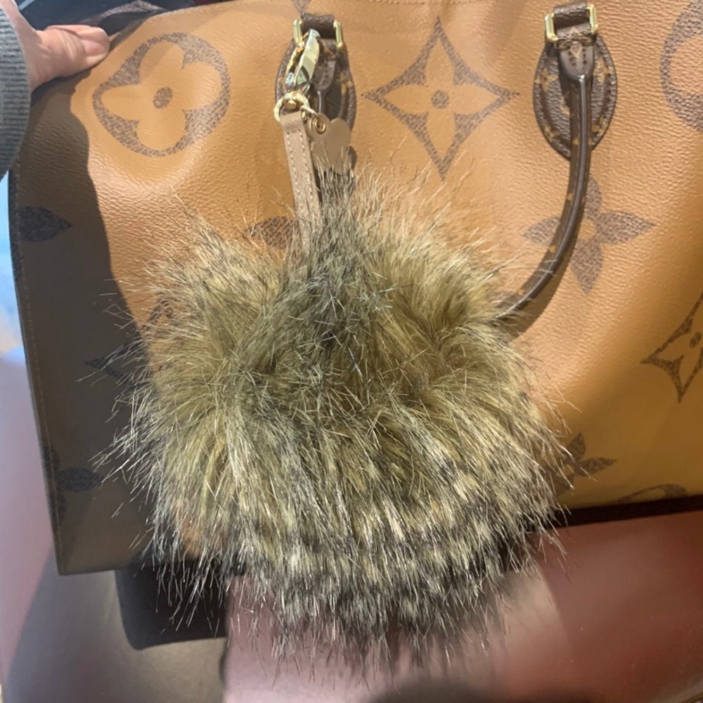 Henry Bendel Pom